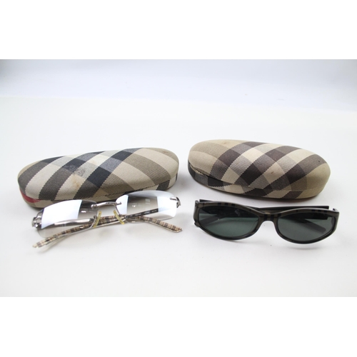 627 - Two pairs of cased Burberry sunglasses