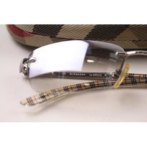 627 - Two pairs of cased Burberry sunglasses