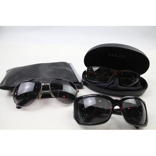 628 - Three pairs of sunglasses to include Gucci etc.