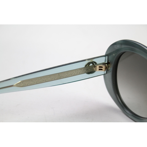 629 - A cased pair of Gucci sunglasses