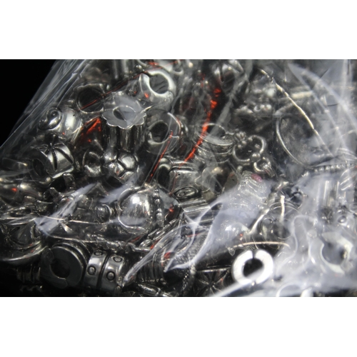 643 - Approx. 3kg shop stock charms