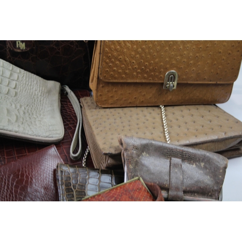 698 - A collection of handbags and purses