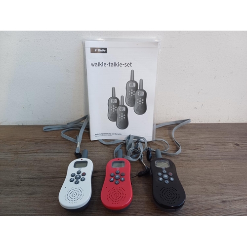 848 - Three Tchibo 242696 walkie-talkies with instruction manual