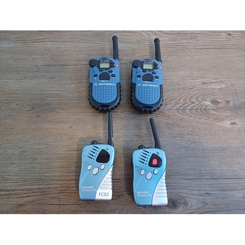 849 - Two pairs of walkie-talkies, one Motorola TA-200 and one Telcom Talkeasy 100