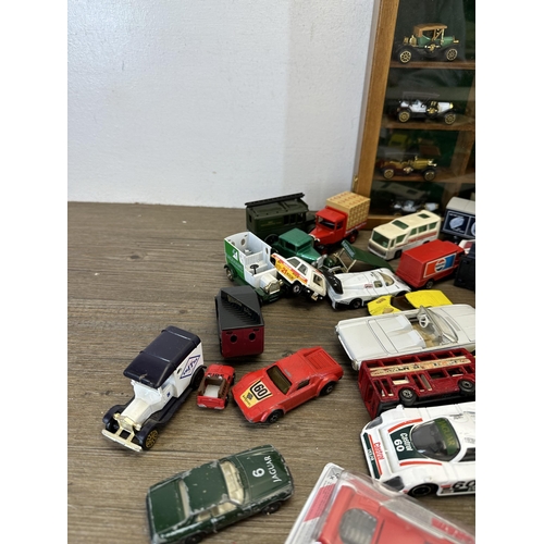 315 - A collection of unboxed die-cast model vehicles to include Lesney models of Yesteryear 1926 type 35 ... 