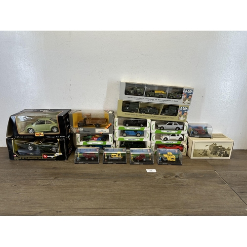 316 - A collection of boxed die-cast model vehicles to include Maisto Special Edition Volkswagon New Beetl... 