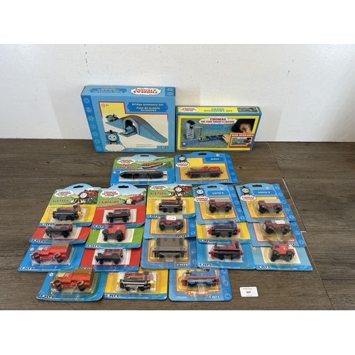 327 - A collection of boxed and packaged ERTL Thomas the Tank Engine & Friends model vehicles and accessor... 