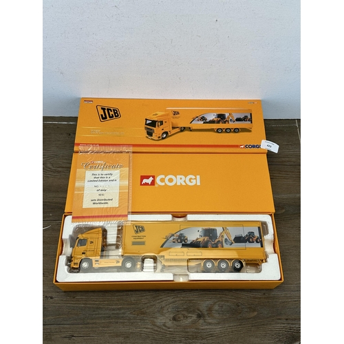 423 - A boxed Corgi CC13237 JCB DAF XF Space Cab Exhibition Unit limited edition 1:50 scale die-cast model... 