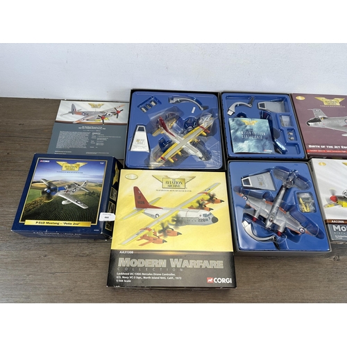 444 - Four boxed Corgi The Aviation Archive die-cast model aircrafts, AA32204, AA32808, AA35812 and AA3130... 