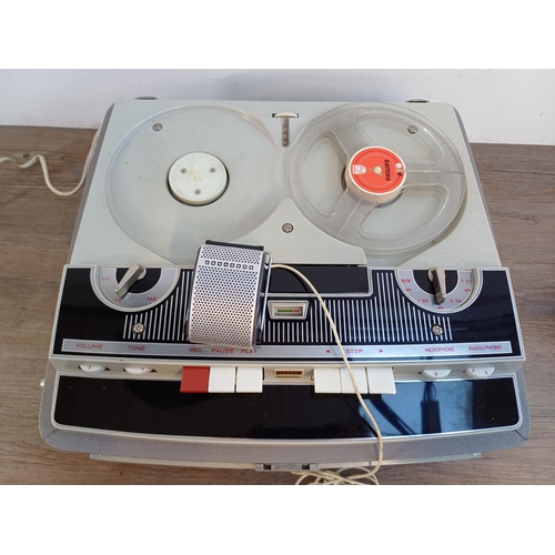 870 - A mid 1960s Stella ST459A/15 solid state reel-to-reel tape recorder with microphone and instruction ... 