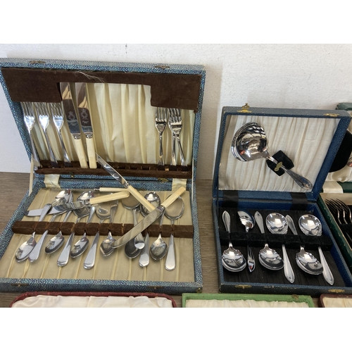 533 - Nine vintage cased cutlery sets