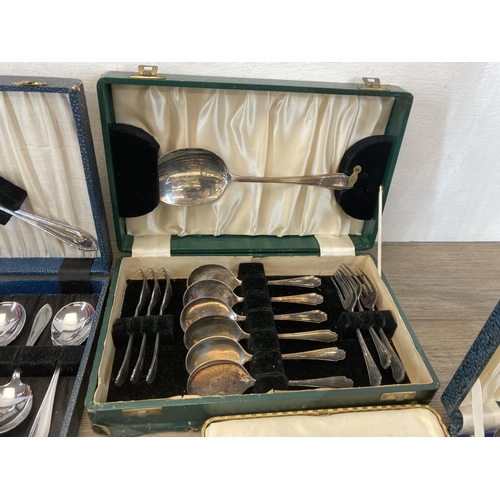 533 - Nine vintage cased cutlery sets