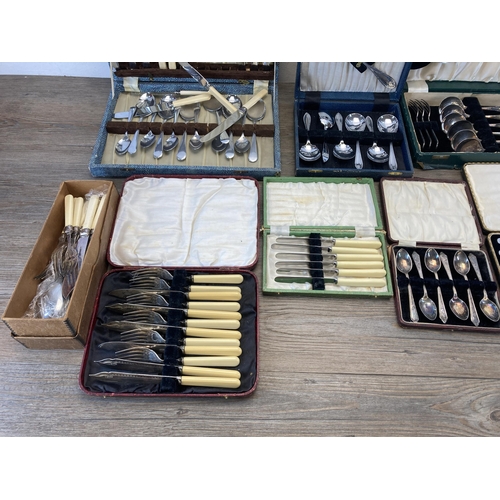 533 - Nine vintage cased cutlery sets