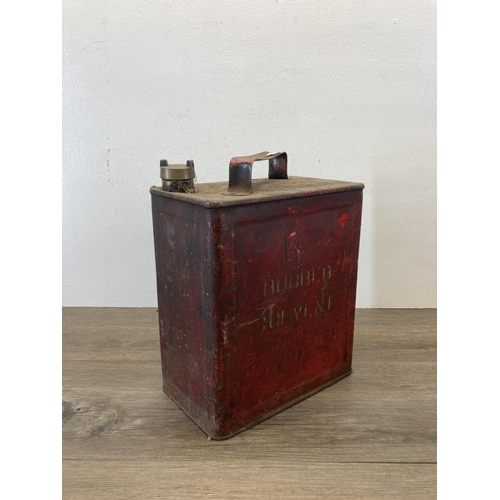 536 - A vintage SM & BP Ltd. red metal petrol can with original brass cap