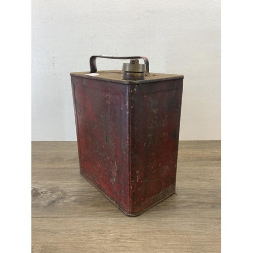 536 - A vintage SM & BP Ltd. red metal petrol can with original brass cap