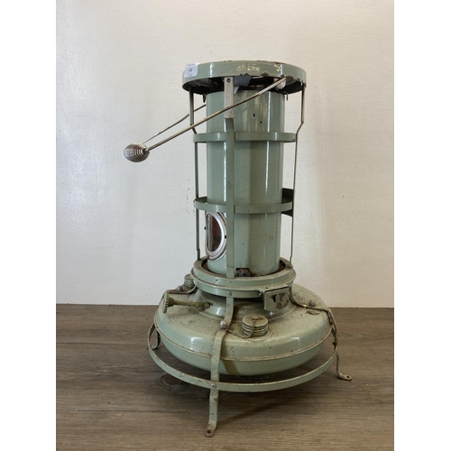 542 - A mid 20th century Aladdin green enamel paraffin heater - approx. 55cm