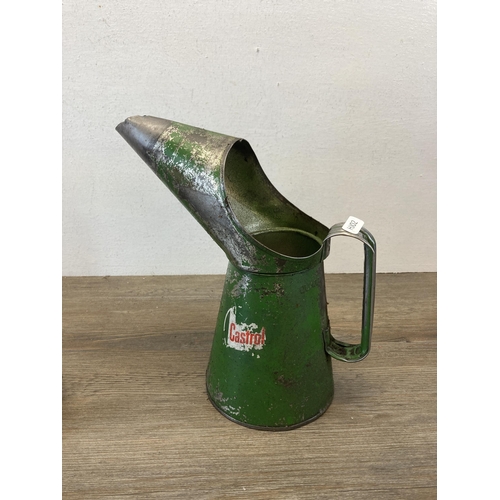 543 - Two mid 20th century graduating Castrol oil cans