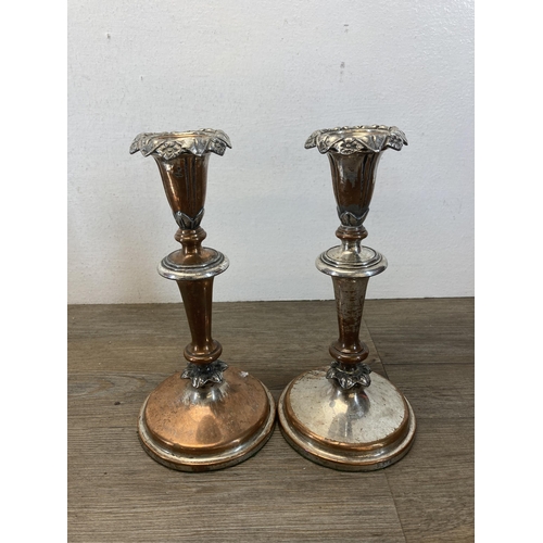 545 - A collection of 19th century and later EPNS and silver plated ware to include a pair of candlesticks... 