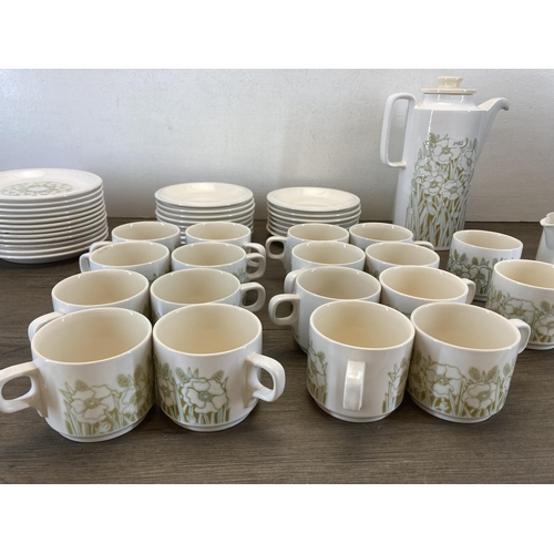 556 - A collection of 1970s Hornsea Fleur pottery to include eighteen coffee cups, coffee pot etc.