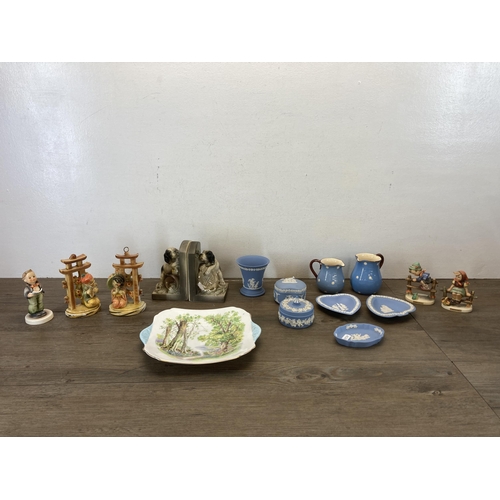 559 - A collection of ceramics and chalkware to include six pieces of Wedgwood pale blue Jasperware, three... 