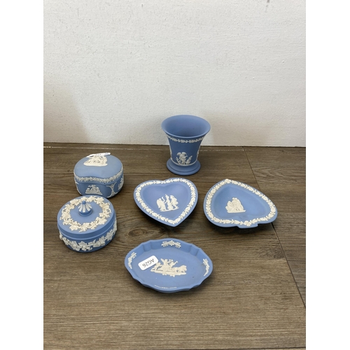 559 - A collection of ceramics and chalkware to include six pieces of Wedgwood pale blue Jasperware, three... 