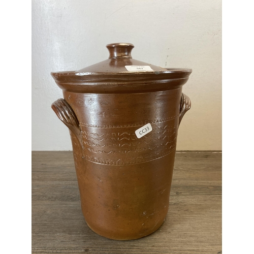 567 - Two salt glazed stoneware twin handled lidded jars - largest approx. 29cm high x 26cm diameter