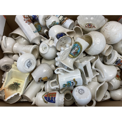 568 - A collection of crested china to include Macintyre Burslem Arms of Colwyn Bay jug with hallmarked st... 