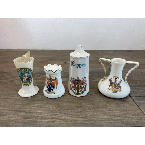 568 - A collection of crested china to include Macintyre Burslem Arms of Colwyn Bay jug with hallmarked st... 