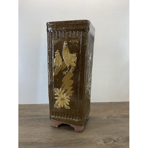 580 - An Oriental glazed terracotta planter/stick stand - approx. 53cm high