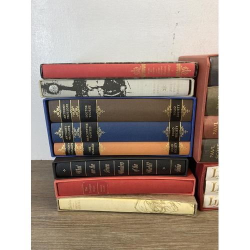 701 - A collection of Folio Society hardback books to include Lucky Jim, Goodbye to All That, What are the... 