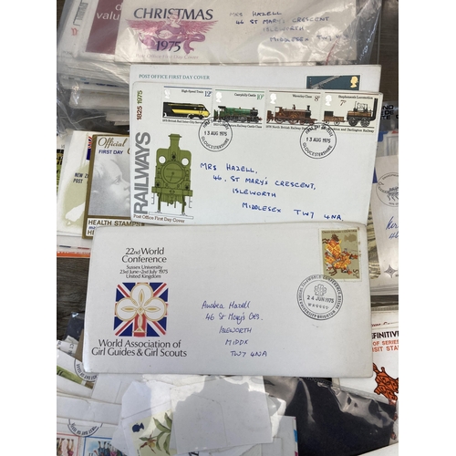 702 - A collection of first day covers and stamps