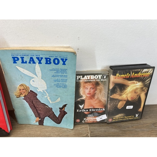 705 - A collection of vintage Playboy adult magazines, videos and hardback books