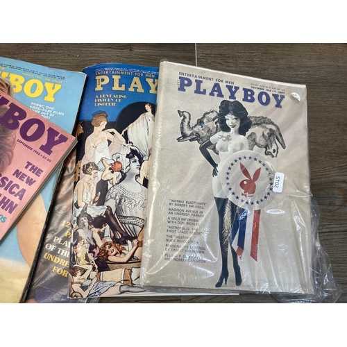 705 - A collection of vintage Playboy adult magazines, videos and hardback books