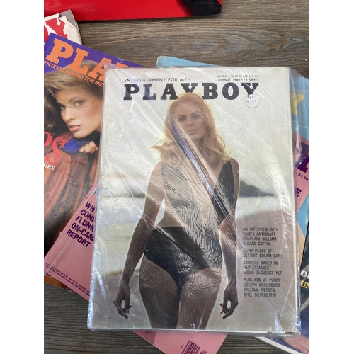 705 - A collection of vintage Playboy adult magazines, videos and hardback books