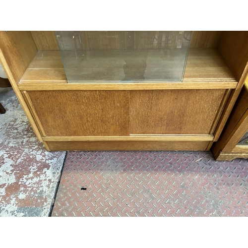 66 - A 1950s G Plan Brandon oak bookcase - approx. 87cm high x 91cm wide x 33cm deep