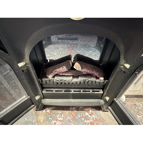 1012 - A Dimplex SHB20LC log burning stove effect electric heater - approx. 67cm high