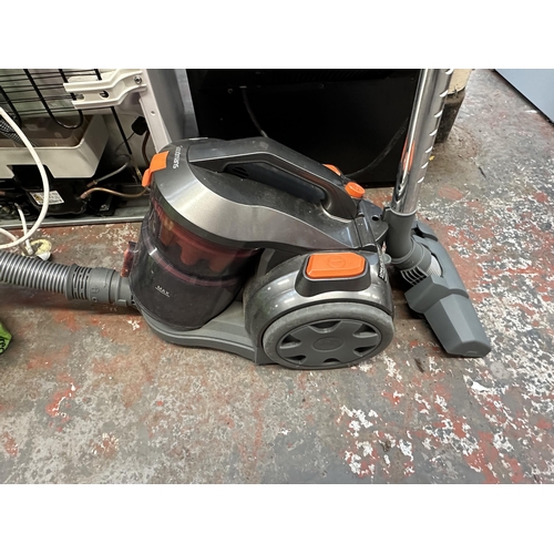 1014 - Two cylinder vacuum cleaners, one Sebo Airbelt K1 Pet Plus with attachments and one Goodmans TurboMA... 