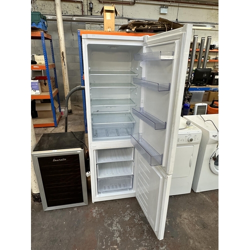 1031 - A Beko CSG1571W upright fridge freezer - approx. 171cm high