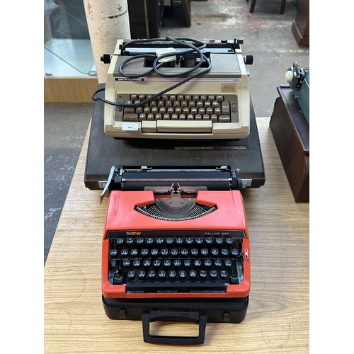 984 - Two cased typewriters, one Smith - Corona C420 electric and one Brother Deluxe 220 portable