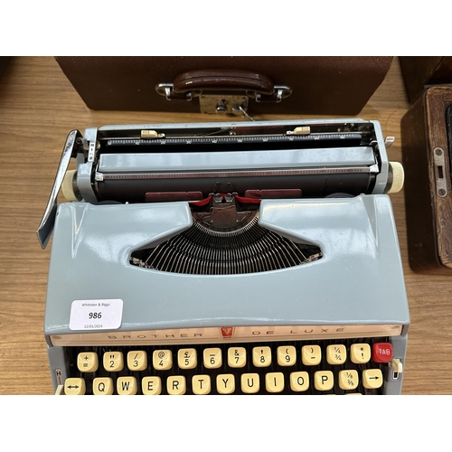 986 - A case Brother De luxe portable typewriter