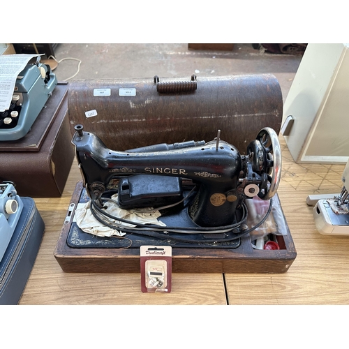 987 - A cased 1926 Singer 66K electric sewing machine with foot pedal and accessories