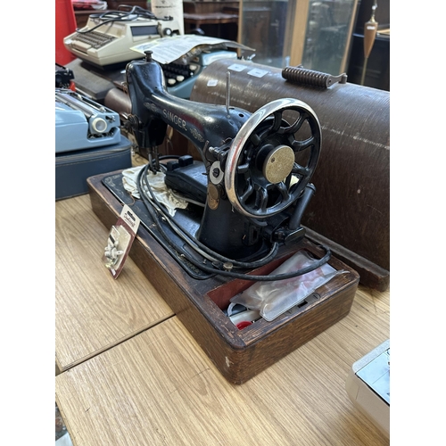 987 - A cased 1926 Singer 66K electric sewing machine with foot pedal and accessories