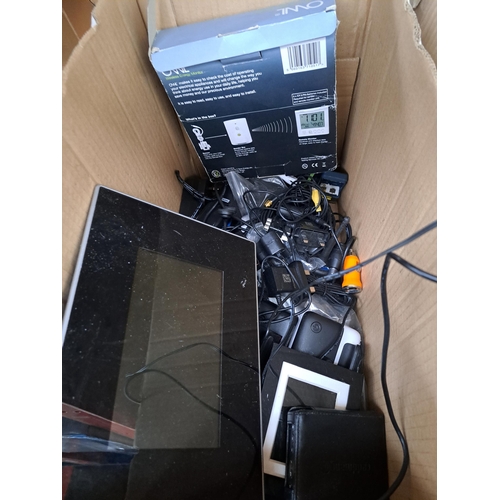 946 - Two boxes containing a large collection of technology related items to include Owl wireless energy m... 