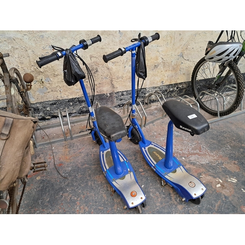 1039 - Two Razor electric scooters