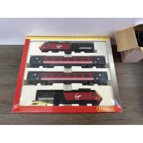 475 - A boxed Hornby No. 3015 Great North Eastern Railway 00 gauge train pack with R964 wall mounted trans... 