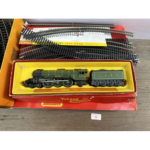 476 - A collection of Hornby 00 gauge model railway accessories to include RS.24 train set, RS.21 train se... 