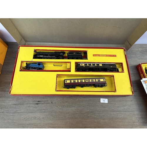 476 - A collection of Hornby 00 gauge model railway accessories to include RS.24 train set, RS.21 train se... 