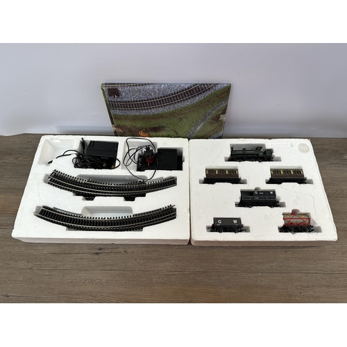 477 - A boxed Hornby R1000 GWR Mixed Traffic 00 gauge electric trainset with boxed R965 Standard train con... 