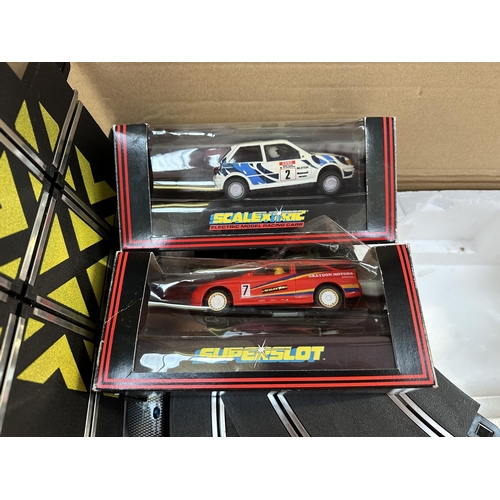 480 - A boxed Scalextric Hyperdrive Bugatti Veyron Blue The Bugatti Veyron Red 1:32 scale slot car set con... 