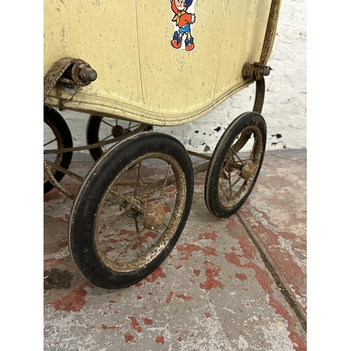 497 - Two items, one Lines Bros Ltd doll's pram and one Tri-ang pedal tricycle